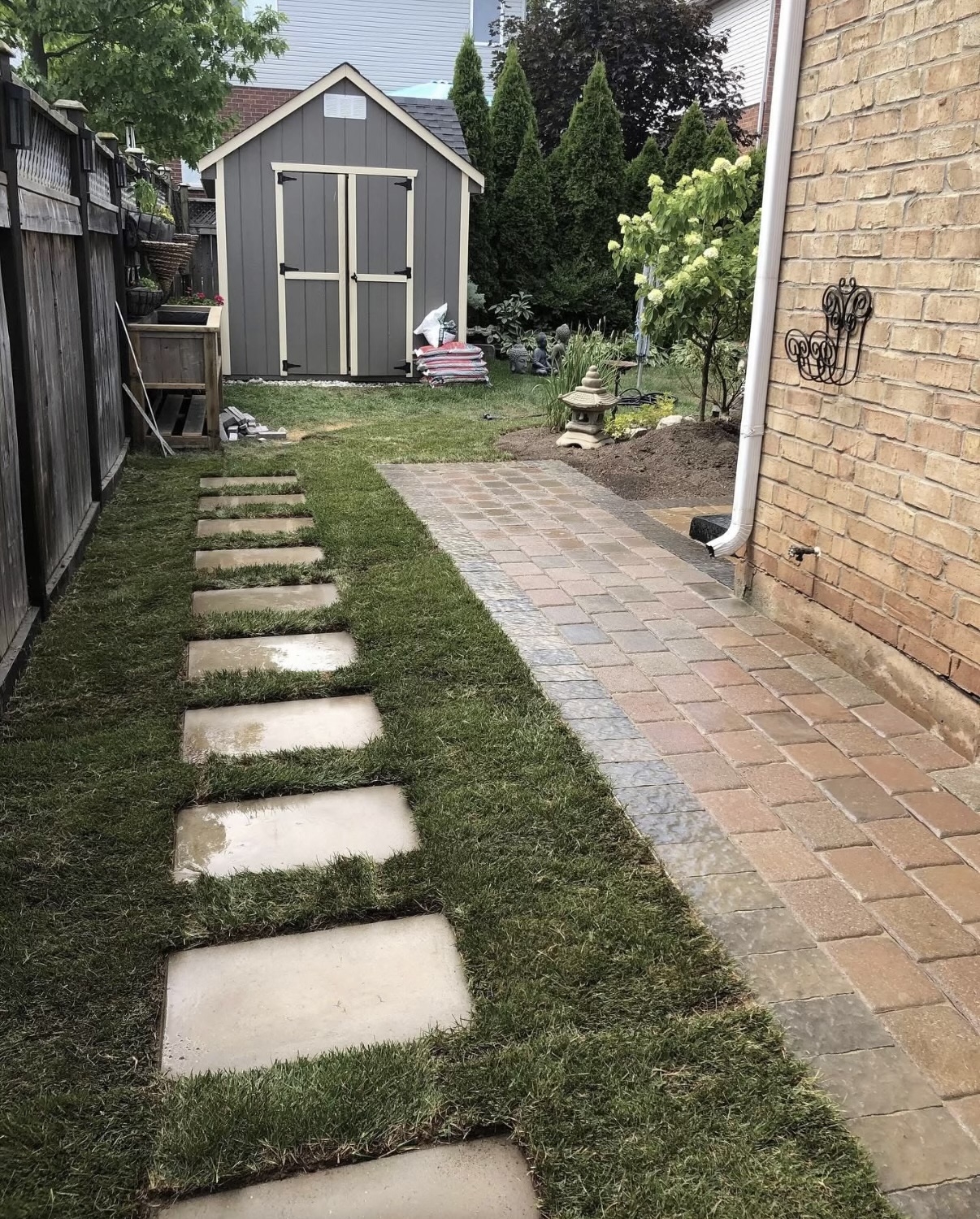 Custom paver walkway with sod installation