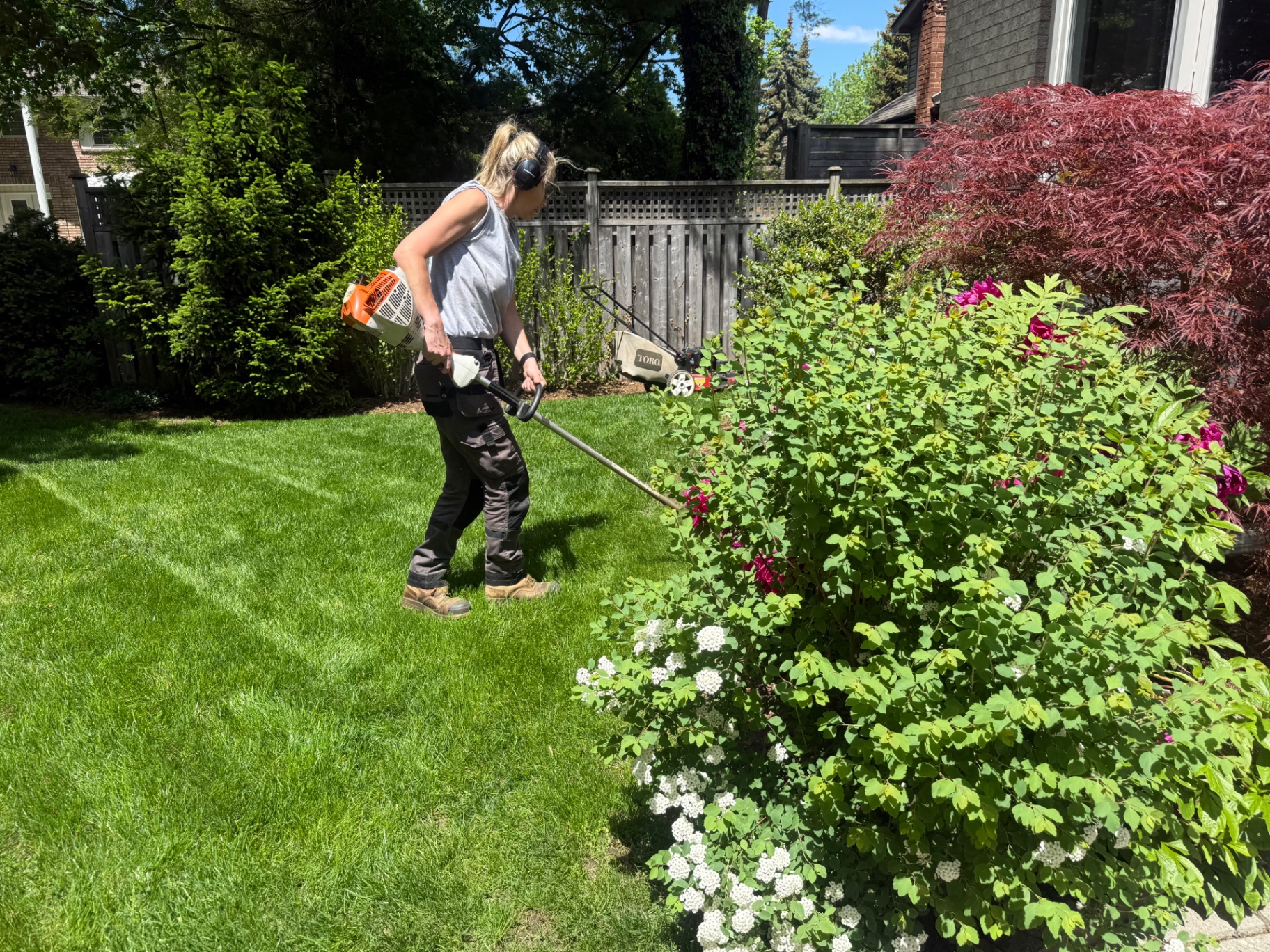 CBR crew trimming garden edges