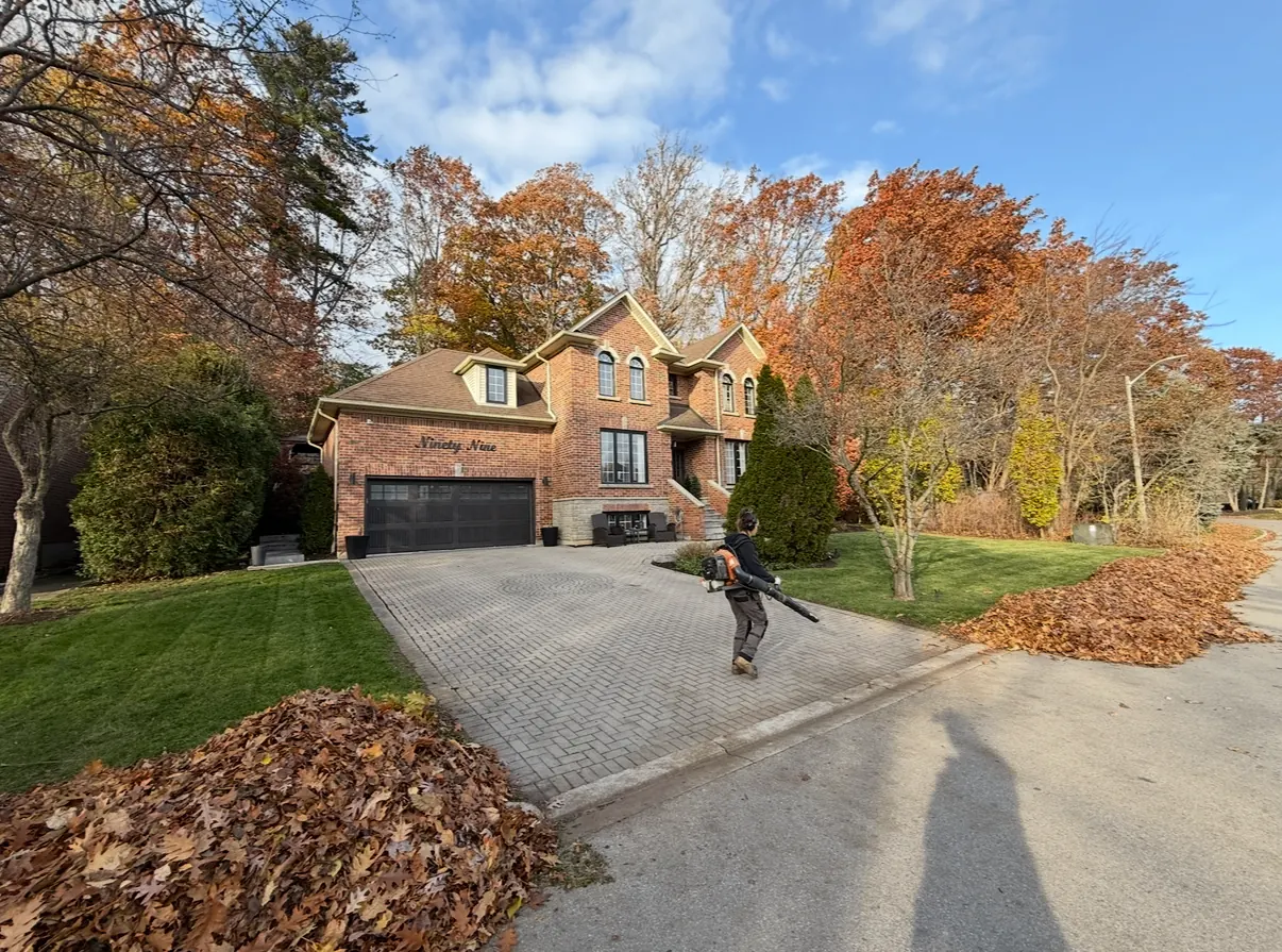 CBR crew blowing leaves during a fall cleanup